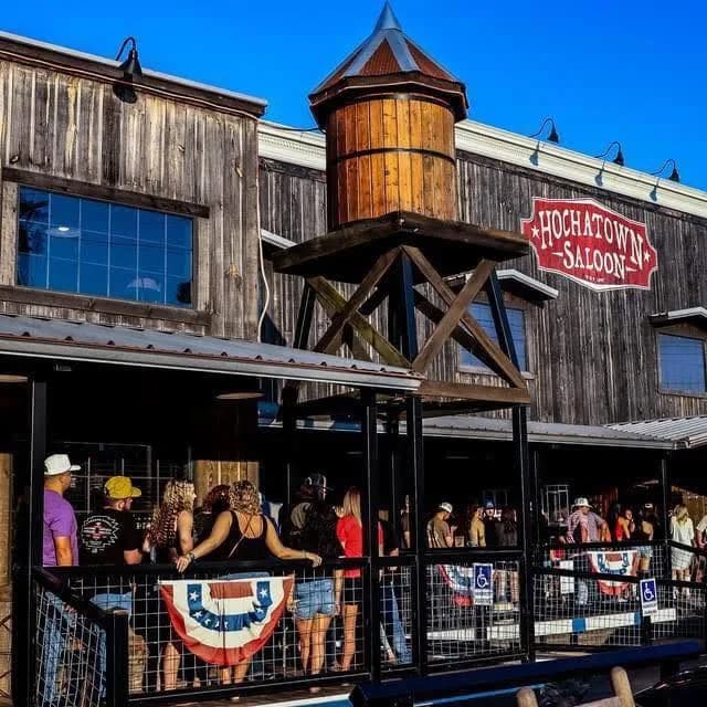 People waiting in line at the Saloon